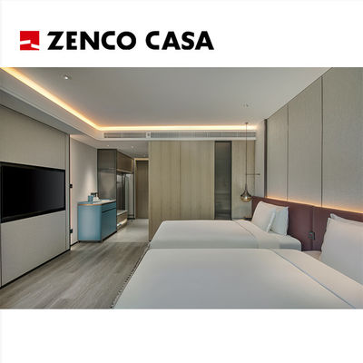 Set di mobili per due camere da letto dell' hotel con letto e divano con cuscini